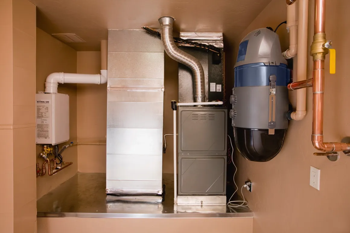 Furnace and air system in utility room.